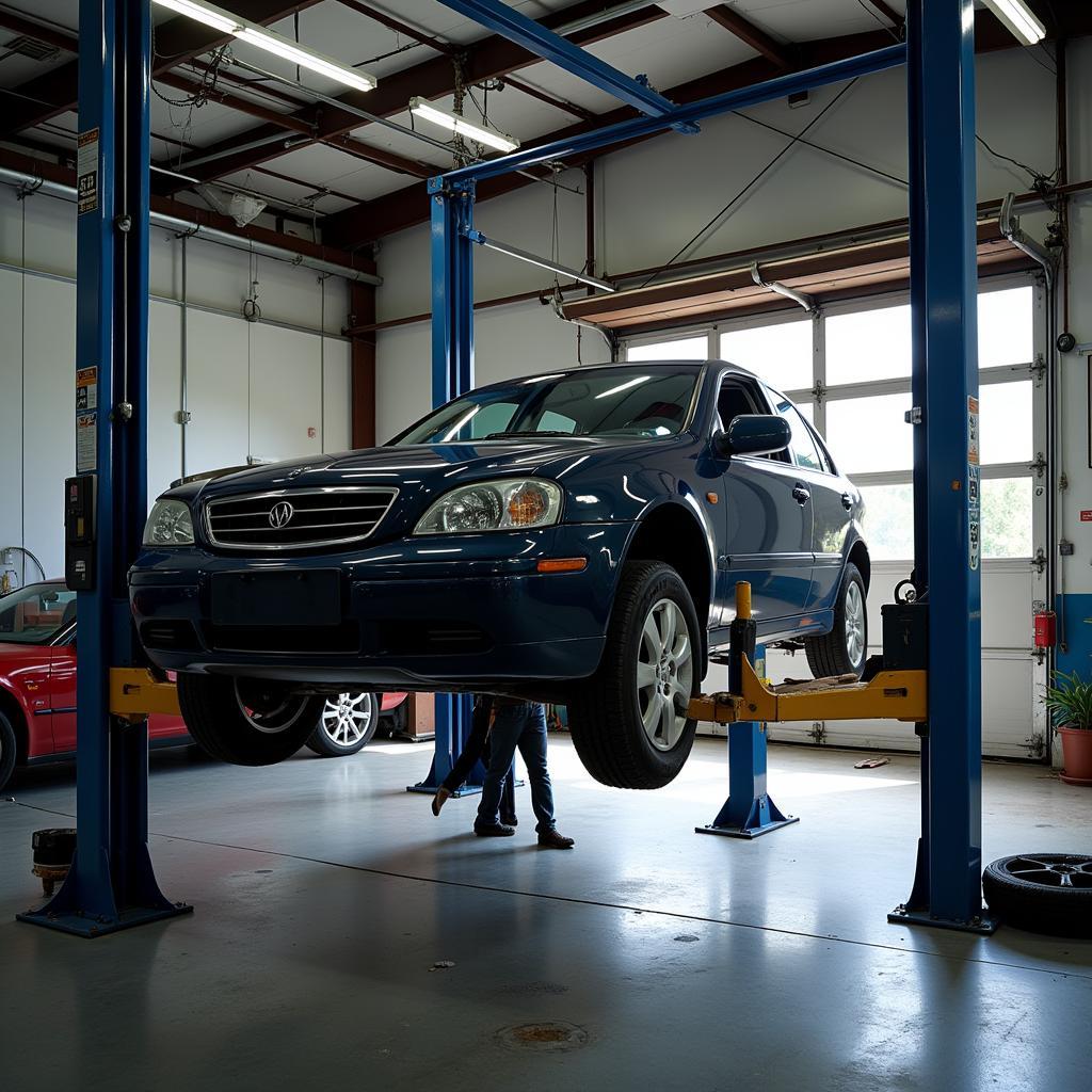 Car being serviced by a mechanic in a professional repair shop