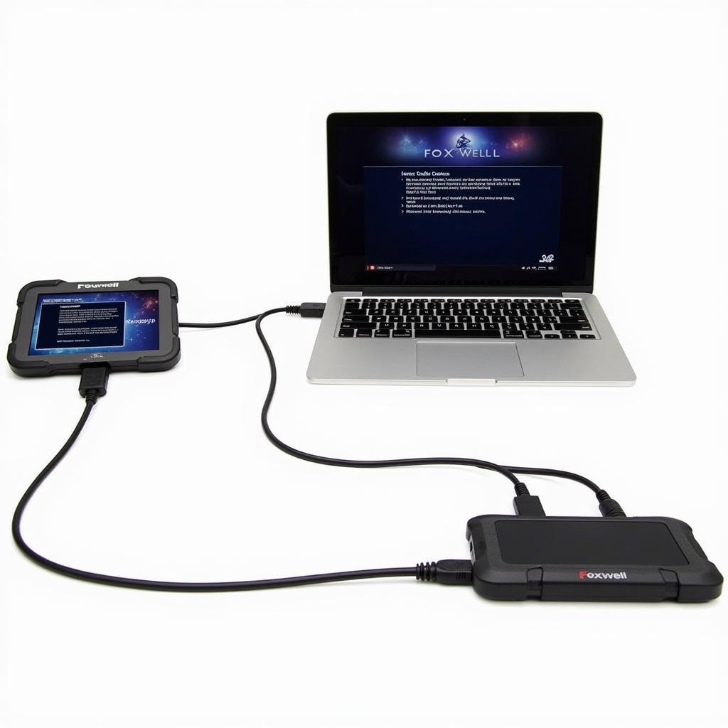 Foxwell NT630 Pro Connected to Laptop for Updates