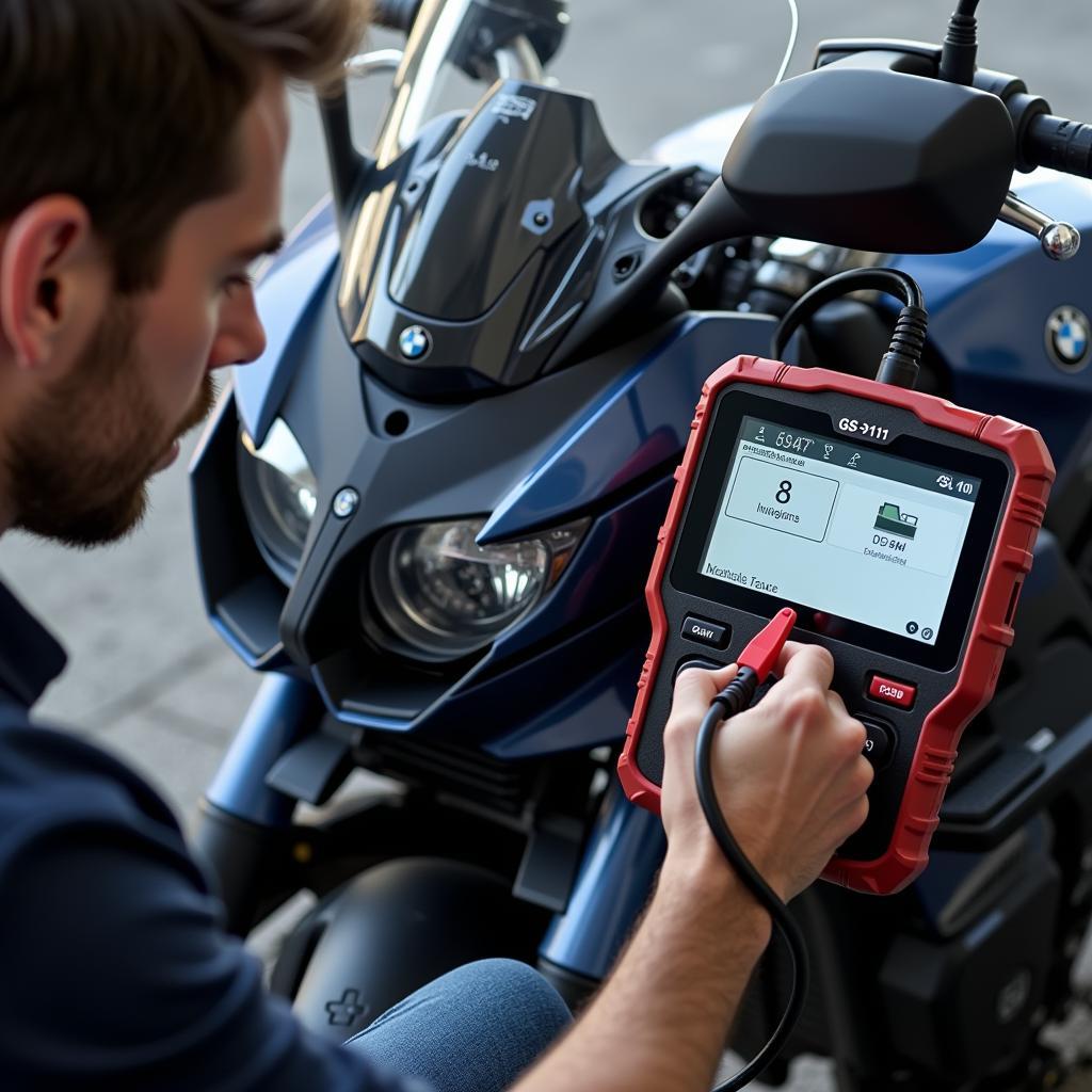 GS-911 diagnostic tool being used on a BMW motorcycle for diagnostics