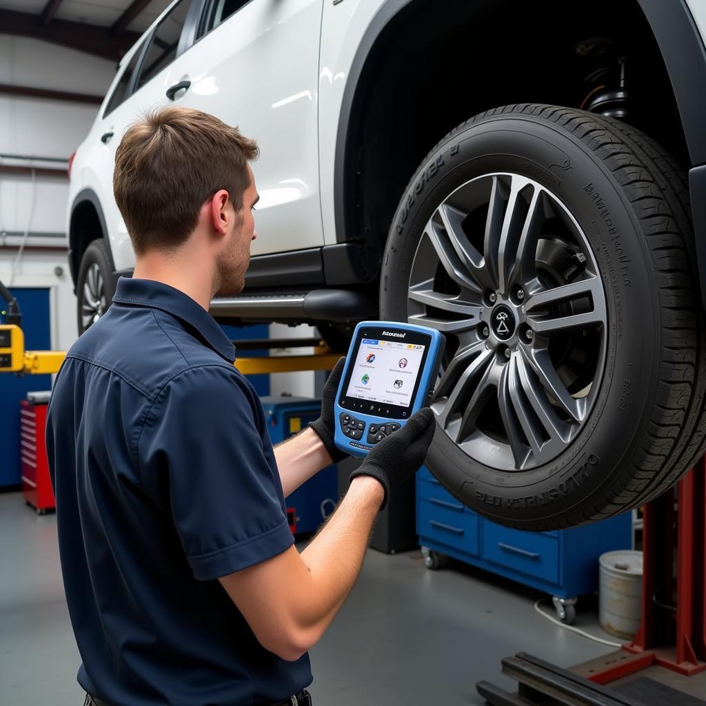 Mechanic Using Foxwell NT624 on Vehicle