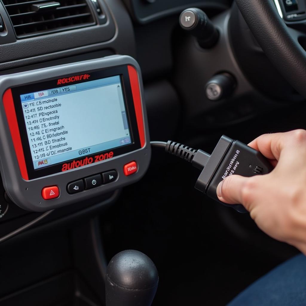 AutoZone Diagnostic Tool Connected to OBD-II Port