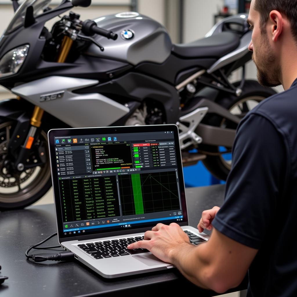 Mechanic Diagnosing a 2016 BMW S1000R with Laptop Software