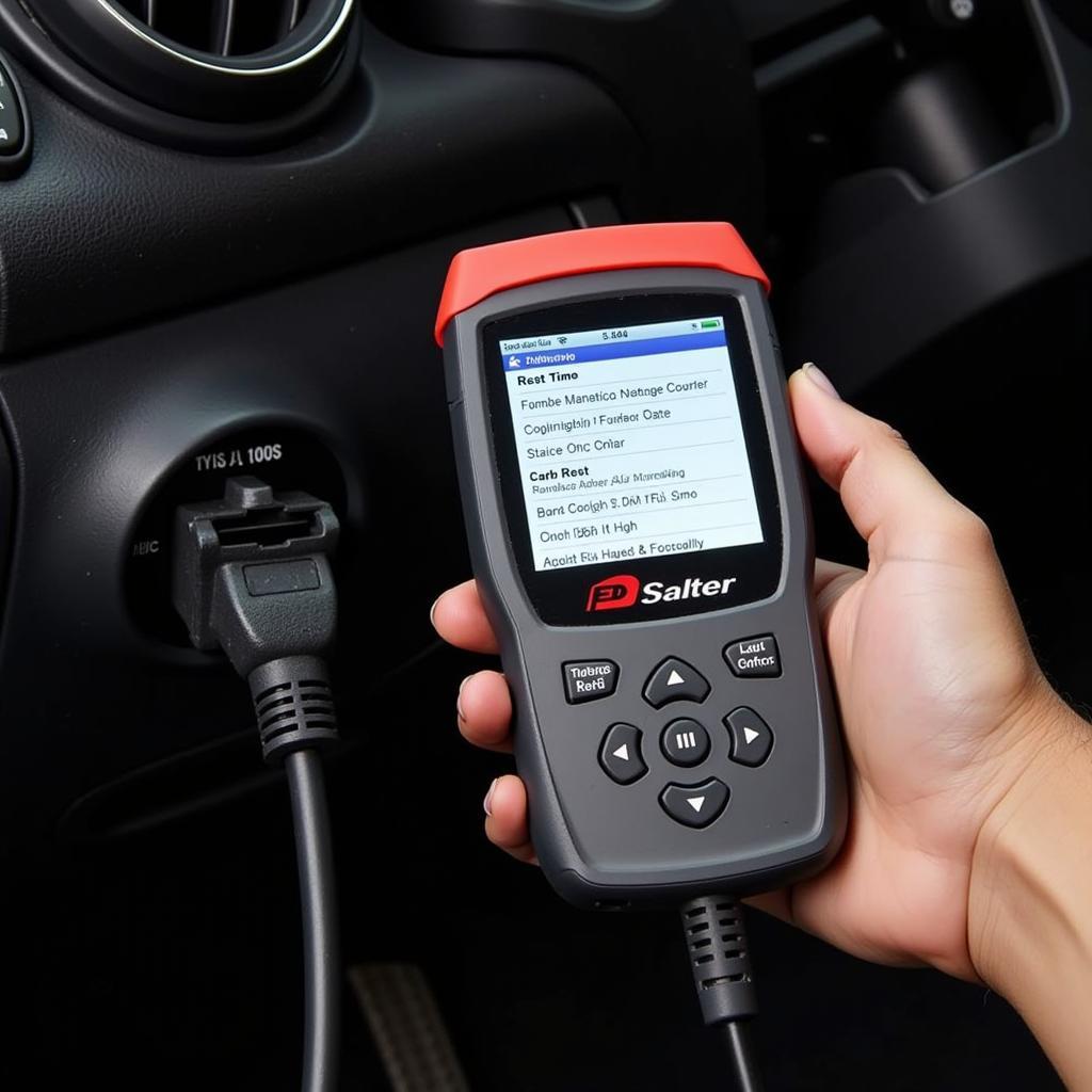 OBD2 scanner connected to a car's diagnostic port